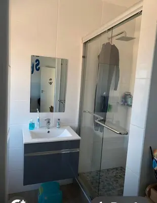 a bathroom with a sink and a shower at Cape Town in Cape Town