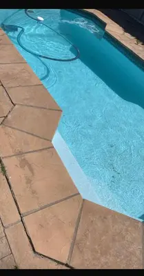 a swimming pool with a hose in the water at Cape Town in Cape Town