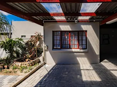 a house with a window on the side of it at Urban Oaks in Bellville