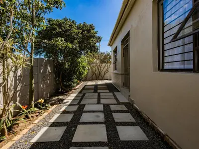 a walkway in front of a building at Urban Oaks in Bellville