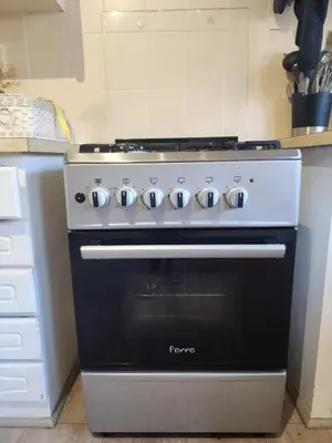 a black and silver stove in a kitchen at 51 on 6th in Hermanus