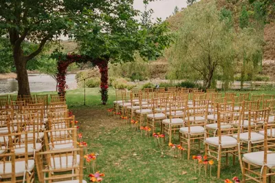 a row of chairs for a wedding ceremony at Elgin River Lodge in Elgin