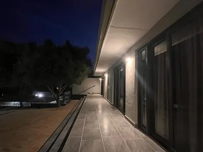 an empty hallway of a building at night at 18 On Louvre Guesthouse in Paarl