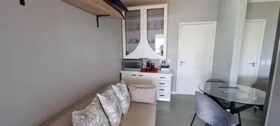 a living room with a glass table and a desk at Studio Kiters Room - Dolphin Beach in Cape Town