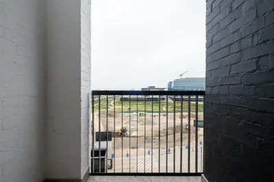 a view of a construction site from a balcony at 510 Riverlands - Lux 1 bedroom Apartment in Cape Town