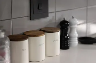 a group of three white containers sitting on a counter at Durbanville Daydream in Durbanville