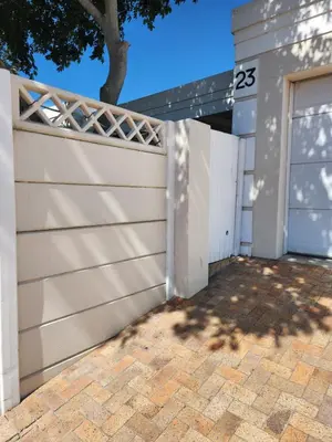 a white garage door with the number on it at Home in Somerset Ridge in Somerset West