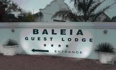 a sign for a guest lodge in front of a house at Baleia Guest Lodge in Hermanus