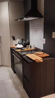 a kitchen with a stove top oven in a kitchen at 6 on Krisant-Durbanville in Oakdale