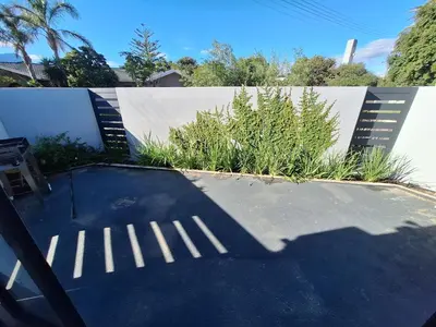 a shadow of a skateboarder on a skate park at 66onjennings Strand in Strand
