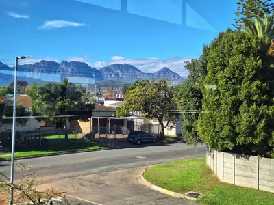 a view of a street with mountains in the distance at 66onjennings Strand in Strand