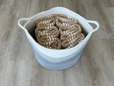 a basket on the floor with a bunch of dogs at Odeon Ocean View in Strand