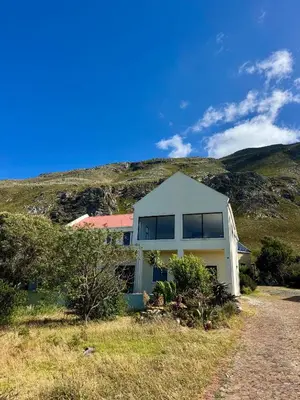 a house on the side of a hill at Sea and Vlei on Disa in Bettyʼs Bay