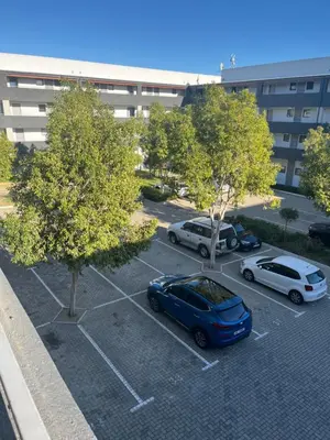 a group of cars parked in a parking lot at Minimalist 2 bed 1 full bathroom in Cape Town