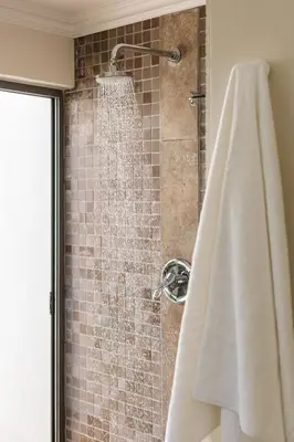 a shower with a shower curtain in a bathroom at Winelands Luxury Accommodation in Stellenbosch