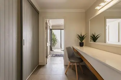 a home office with a desk and a chair at Winelands Luxury Unit in Stellenbosch