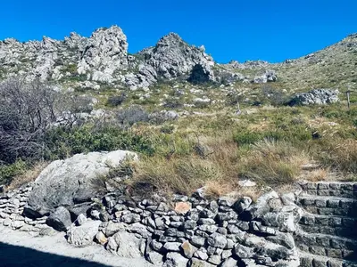 a pile of rocks on the side of a mountain at Hillside View in Pringle Bay