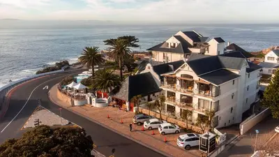 an aerial view of a hotel and the ocean at Harbour House Hotel in Hermanus