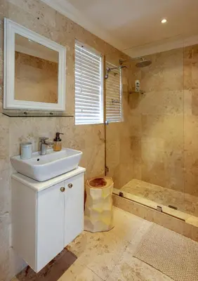 a bathroom with a sink and a shower at Silencio in Hermanus