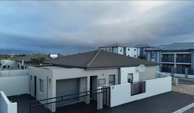 a view from the balcony of a house at Rachel`s Apartments - Stepney Crescent in Cape Town