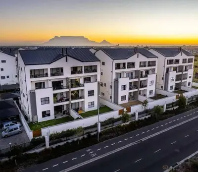 an overhead view of a building next to a highway at Cape Town Apartment with Table Mountain View in Cape Town