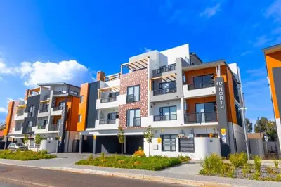 an apartment building on the side of a street at Her Sanctuary in Cape Town
