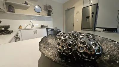 a kitchen with a bowl on top of a counter at Her Sanctuary in Cape Town