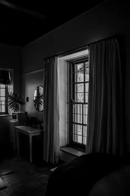 a bedroom with a bed and a window and a sink at Palm La Vie in Worcester