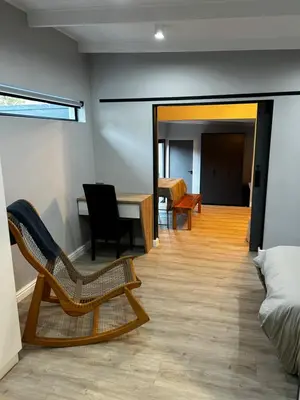 a room with a bed and a table and chairs at Alicante self-catering 2 Bedroom apartment sleeps 4 in Worcester