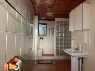 a bathroom with a sink and a shower at AAA Luxury Homes Goodwood Cpt in Elsiesrivier