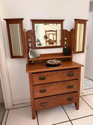 a dresser with a mirror on top of it at Nostalgie - Hermanus Beach Club in Hermanus