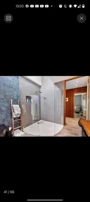 two pictures of a living room and a house at Beach House Living in Gordonʼs Bay