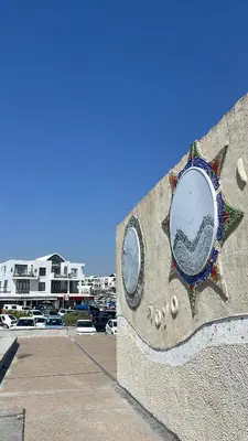 a wall with a painting of a fish on it at Delightful Retreat in Parklands,Cape Farms,Cape Town in Cape Town