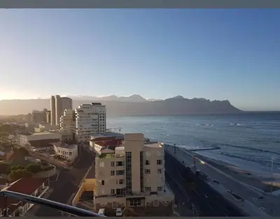 an aerial view of a city and the ocean at Koras little heaven in Strand