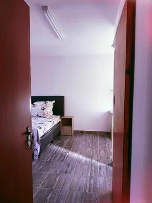 an open door to a bedroom with a bed at ABSD home in Avondale