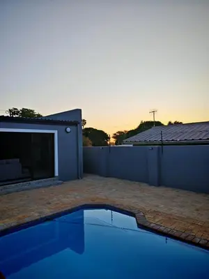a swimming pool on the roof of a house at Kubata Diame B&B in Cape Town