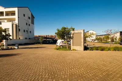 a parking lot with a door in the middle of a street at #AlimamaSpaces The Manson's Fynbos in Cape Town