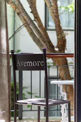 a black chair with the word anymore written on it at Avemore Eikehoff no 2 in Stellenbosch