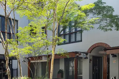 a building with trees in front of it at Avemore Eikehoff no 2 in Stellenbosch