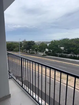 a view of a road from a balcony at Modern stay overlooking Durbanville wine country in Durbanville