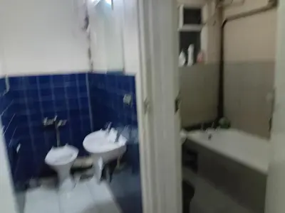 a bathroom with two sinks and a toilet and a tub at Emilia in Bellville