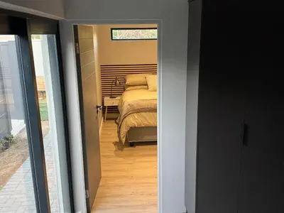 a bedroom with a bed in a room with a window at Alicante in Worcester