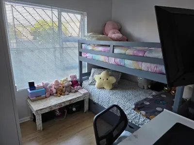 a childs bedroom with bunk beds with stuffed animals at Secure 2 Bedroom Ground Floor Apartment in Joostenberg Vlakte