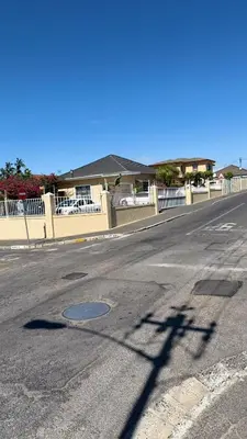 an empty street with a power pole in the middle at Home of peace self catering accommodation