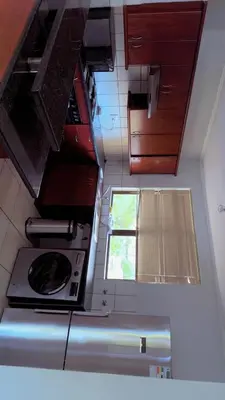 an overhead view of a kitchen with a stove at De Groove Luxury Homes in Cape Town