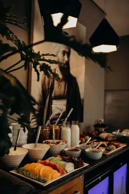 a buffet with many different types of food on a table at Franschhoek Boutique Hotel - Lion Roars Hotels & Lodges in Franschhoek