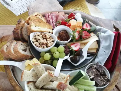 a plate of food with different types of food at Atlantic Palms in Cape Town