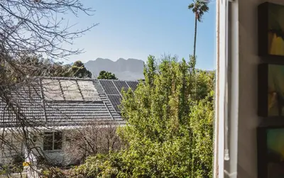 a view from a window of a house with a roof at Brookwood Cottage in Somerset West