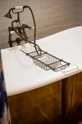 a sink with a metal basket on top of it at Akademie Street Boutique Hotel in Franschhoek