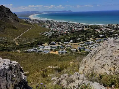 an aerial view of a city and the ocean at The Gables Hermanus in Hermanus